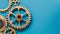 Machine cogs on a blue background. Royalty Free Stock Photo