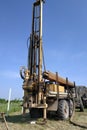 Machine for drilling wells for water, drilling a well in the garden, the drilling process close up