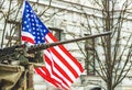 Machine gun mounted on United States Marine Corps forces tank or military vehicle with American flag Royalty Free Stock Photo