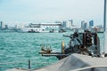 Machine gun on navy warship running on sea Royalty Free Stock Photo