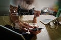 designer using smart phone and keyboard dock digital tablet with Royalty Free Stock Photo
