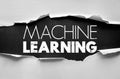 MACHINE LEARNING text concept on torn paper background illustrating artificial intelligence, data science, automation, and Royalty Free Stock Photo