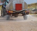 Machine for moistening dust on road