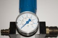 Machine part bar barometer pressure air metering scale with blue arrow in bar device isolated with white background machine Royalty Free Stock Photo