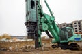 Machine for the piling works at a construction site Royalty Free Stock Photo