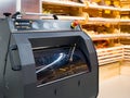 Machine for self-cutting bread in the bread department of the store