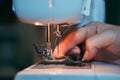 Machine sewing, hand in the process