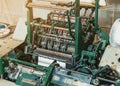 Machine for stitching sheets of paper in the printing. Magazine, brochure, book. Production of printed products. Vintage