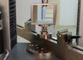 Machine for testing samples for tensile strength