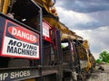 A machine to do railroad ballast maintenance with stormy skys