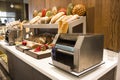 Machine for toasting bread - toaster, a variety of baguettes and Royalty Free Stock Photo