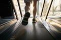 Machine treadmill with people running closeup at fitness gym