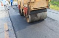 Machine working of asphalt road construction Royalty Free Stock Photo