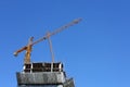 Machinery crane working in construction site building Royalty Free Stock Photo