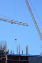 Machinery crane working in construction site building industry Royalty Free Stock Photo