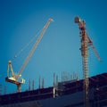 Machinery crane working in construction site building industry Royalty Free Stock Photo