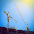 Machinery crane working in construction site building industry Royalty Free Stock Photo