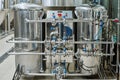 Machinery for fermenting of beer at brewery Royalty Free Stock Photo