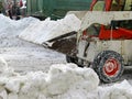 Machinery snowblower. Natural disasters winter, blizzard, heavy snow paralyzed the city, collapse. Snow covered the cyclone Europe