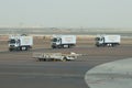 Machines of the airline Etihad Airways is returned after the loading of the aircraft. The Abu Dhabi Airport Royalty Free Stock Photo