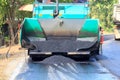 Machines are pouring asphalt on roads under construction and repair. And new construction makes traveling in the countryside of Royalty Free Stock Photo