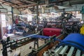 Machines in silk weaving workshop, textile factory in Amarapura, Burma Myanmar