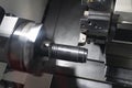machining automotive part by cnc turning machine Royalty Free Stock Photo