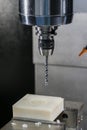 Machining precision part by CNC machining center