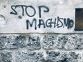 Grafitti in Spain warns to `STOP MACHISMO` Royalty Free Stock Photo