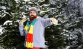 Macho with beard and mustache throws snowball. Royalty Free Stock Photo