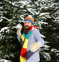 Macho with beard and mustache throws snowball. Royalty Free Stock Photo