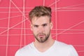 Macho with beard on unshaven face. Bearded man with blond hair and stylish haircut. Handsome guy with healthy young skin face. Hai Royalty Free Stock Photo