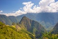 Machu Picchu archeological site and Wayna Picchu illuminated by the sunlight. Royalty Free Stock Photo