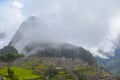 MACHU PICCHU, CUSCO REGION, PERU- JUNE 4, 2013: Panoramic view of the 15th-century Inca citadel Machu Picchu Royalty Free Stock Photo