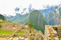 MACHU PICCHU, CUSCO REGION, PERU- JUNE 4, 2013: Panoramic view of the 15th-century Inca citadel Machu Picchu Royalty Free Stock Photo