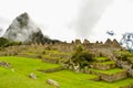 MACHU PICCHU, CUSCO REGION, PERU- JUNE 4, 2013: Panoramic view of the 15th-century Inca citadel Machu Picchu Royalty Free Stock Photo