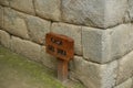 Wooden sign for Casa Del Inka at The Ancient 15th-century Inca citadel of Machu Picchu, Peru, October 6, 2023.