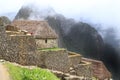 Machu Picchu's house and cloudy mountains Royalty Free Stock Photo