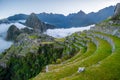 Machu Picchu site before sunrise covered in mist clouds, Cuzco, Peru, South America Royalty Free Stock Photo