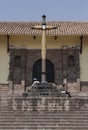 Close up of a cross in front a catholic church Royalty Free Stock Photo