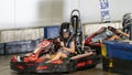 A Child Driving a Go-Kart Circuit