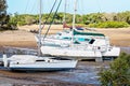 Boats Stranded In A Creek At Low Tide