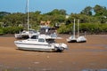 Boats Stranded On The Mud At Low Tide In A Creek