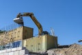 Industrial Machinery Working In A Quarry Excavating Rock