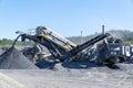 Industrial Machinery Working In A Quarry Excavating Rock