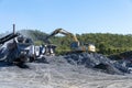 Industrial Machinery Working In A Quarry Excavating Rock