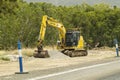Machine Working On Highway Duplication Roadworks