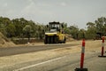 Machine Working On Highway Duplication Construction Roadworks