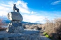 Mackenzie Sheep Dog, The bronze statue of the dog on the shores of Lake Tekapo in a beautiful day with blue sky.