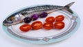 Mackerel with cherry tomatoes and red onions Royalty Free Stock Photo